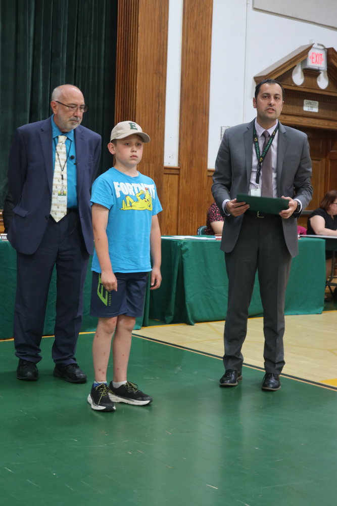 Lucas Ryman was helpful in cleaning up after an assembly, was named a student standout, and received a certificate and a coupon for a free ice cream cone.